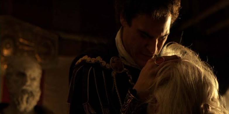 A screenshot from the movie Gladiator,showing commodus is killing his father.